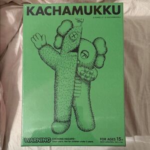 Kaws Kachamukku painted “green & red” vinyl figure